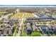 An aerial view of the neighborhood, highlighting the community layout with open spaces and modern homes at 3503 Albritton St, New Port Richey, FL 34655
