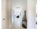 Hallway leading into living room with tile flooring at 35524 Quartz Lake Dr, Zephyrhills, FL 33541