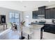 Kitchen island with stone countertops at 35524 Quartz Lake Dr, Zephyrhills, FL 33541