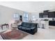 Bright, open living space with modern finishes and plenty of seating at 35524 Quartz Lake Dr, Zephyrhills, FL 33541