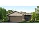 Charming one-story home featuring a neutral color scheme, well-manicured lawn, and an attached two-car garage at 4017 Direct Green Pl, Bradenton, FL 34208