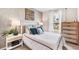 Charming bedroom featuring modern decor and a cozy bed with decorative pillows and matching nightstands at 4113 Goldheart Blvd, Bradenton, FL 34208