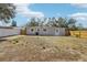 Back exterior of home featuring new fence at 4208 E Sandalwood S Cir, Tampa, FL 33617