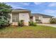 Attractive single-story residence with well-maintained landscaping and an attached two-car garage at 4611 Anaconda Dr, New Port Richey, FL 34655