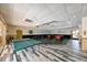 Community game room features tile floors, ping pong table, pool tables, dart board and ample seating at 5820 N Church Ave # 430, Tampa, FL 33614