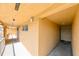 The condo hallway shows unit 430 in a neutral color with an exit sign visible at the end at 5820 N Church Ave # 430, Tampa, FL 33614