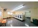 Clean laundry room equipped with multiple washing machines and comfortable seating at 5820 N Church Ave # 430, Tampa, FL 33614
