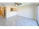 This living room features a breakfast bar, recessed lighting, tile floors, and a ceiling fan at 5820 N Church Ave # 430, Tampa, FL 33614