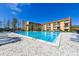 Inviting swimming pool with clear blue water, surrounded by comfortable lounge chairs at 5820 N Church Ave # 430, Tampa, FL 33614