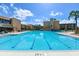 Large swimming pool with lane markers, perfect for exercise and relaxation, set in a beautiful complex at 5820 N Church Ave # 430, Tampa, FL 33614