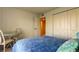 Bedroom features view, seating area, and double closet at 6290 Bahia Del Mar Cir # 5, St Petersburg, FL 33715
