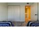 Bedroom with twin beds and a view of the hallway at 6290 Bahia Del Mar Cir # 5, St Petersburg, FL 33715