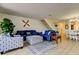 Inviting living room with stairs, comfortable furniture, and access to the dining area at 6290 Bahia Del Mar Cir # 5, St Petersburg, FL 33715