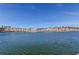 Expansive waterfront view showcasing palm trees and community buildings at 6290 Bahia Del Mar Cir # 5, St Petersburg, FL 33715