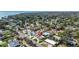 Real estate aerial view of the property and neighborhood with coastal location marker near the water at 6891 4Th S St, St Petersburg, FL 33713