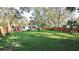 View of the house from the backyard featuring the surrounding landscape at 7043 Lang St, Brooksville, FL 34601