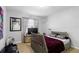 Bedroom featuring gray walls, a TV, and modern decor at 7210 N Manhattan # 1822, Tampa, FL 33614