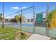 Outdoor community tennis court with well maintained playing surface at 7210 N Manhattan # 1822, Tampa, FL 33614