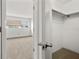 Bedroom showcasing plush carpeting, window views, and closet spaces for relaxing living at 8460 Calais N # 8406, Pinellas Park, FL 33781
