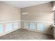 Bright room features neutral walls, tile flooring, and ample natural light from a window, perfect flex space at 8460 Calais N # 8406, Pinellas Park, FL 33781