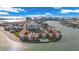 Beautiful aerial view showcasing the waterfront property and its community pool in a desirable location at 855 Bayway Blvd # 105, Clearwater, FL 33767