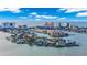 Waterfront homes with boat docks in a coastal community offer stunning ocean views and luxurious living at 855 Bayway Blvd # 105, Clearwater, FL 33767