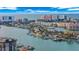 Scenic aerial view of a waterfront community with yachts docked along the picturesque coastline at 855 Bayway Blvd # 105, Clearwater, FL 33767
