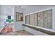 Mailboxes and community posting area on the ground floor of a building at 855 Bayway Blvd # 105, Clearwater, FL 33767