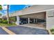 Covered parking garage showing assigned private parking at 855 Bayway Blvd # 105, Clearwater, FL 33767