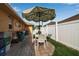 Outdoor patio area with table and chairs at 127 Jennifer Dr, Rotonda West, FL 33947