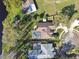 Aerial of homes with swimming pools near winding road at 1301 Jen Ma Jo Ln, Lutz, FL 33549