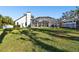 Spacious backyard with a screened-in lanai, perfect for outdoor living at 1301 Jen Ma Jo Ln, Lutz, FL 33549