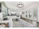 Open-concept living room offers seamless flow into the kitchen and dining area, perfect for entertaining at 1301 Jen Ma Jo Ln, Lutz, FL 33549
