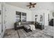 Covered patio with comfortable seating, offering a relaxing outdoor space for gatherings at 1301 Jen Ma Jo Ln, Lutz, FL 33549