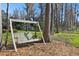 Close up of backyard swing next to lake at 1301 Jen Ma Jo Ln, Lutz, FL 33549