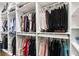 Organized walk-in closet with ample storage and hanging space at 1301 Jen Ma Jo Ln, Lutz, FL 33549