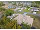 Beautiful home featuring RV parking on a quiet street, with mature trees and a well-maintained lawn at 13635 Coronado Dr, Spring Hill, FL 34609