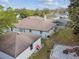Charming single-story home featuring a screened-in pool, and a peaceful backyard at 13635 Coronado Dr, Spring Hill, FL 34609