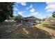 Fully fenced in back yard with a large screened in pool area at 13635 Coronado Dr, Spring Hill, FL 34609