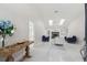 Bright living room features furniture, skylights and fireplace at 13635 Coronado Dr, Spring Hill, FL 34609