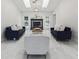 Bright living room features furniture, skylights and fireplace at 13635 Coronado Dr, Spring Hill, FL 34609