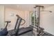 Community fitness center with treadmill, weightlifting machine, and exercise bike at 14 Somerset St # 5C, Clearwater, FL 33767
