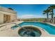 Community pool and hot tub area with ocean views and comfortable lounging areas at 14 Somerset St # 5C, Clearwater, FL 33767
