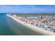 Panoramic view of the property near the beach and canal, with easy access to beachside amenities at 146 175Th Terrace E Dr, Redington Shores, FL 33708