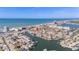 Wonderful location along the beach with harbor access, indicated by red arrow for location purposes at 146 175Th Terrace E Dr, Redington Shores, FL 33708