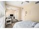 Comfortable bedroom provides two closets, ceiling fan, wood-look floors, and an attached living space at 146 175Th Terrace E Dr, Redington Shores, FL 33708