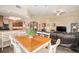 Open floor plan with a dining table and living area at 146 175Th Terrace E Dr, Redington Shores, FL 33708