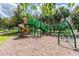 A well-maintained playground with a variety of equipment for children to enjoy at 15721 Starling Water Dr, Lithia, FL 33547