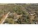Expansive piece of land surrounded by trees and other homes, with development potential in a quiet neighborhood at 20238 Shetland Ln, Spring Hill, FL 34610