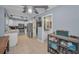 Spacious kitchen with views of a dinette, and entry to a half bath at 2180 Clover Hill Rd, Palm Harbor, FL 34683